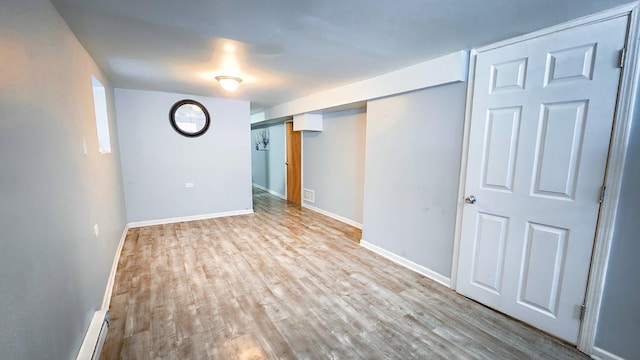 7250 S Morgan St, Chicago, IL 60621 - unfurnished room featuring wood finished floors and baseboard heating