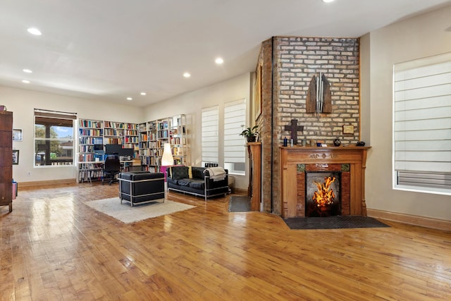 4424 S University Ave, Chicago, IL 60653 - living area featuring hardwood / wood-style floors, a fireplace, and recessed lighting