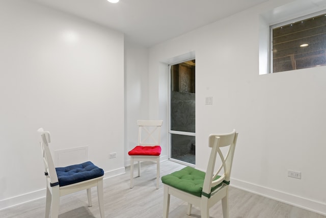 4424 S University Ave, Chicago, IL 60653 - sitting room featuring wood finished floors and baseboards