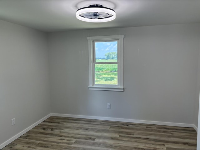 5101 W 1000 N Rd, Kankakee, IL 60901 - empty room featuring wood finished floors and baseboards