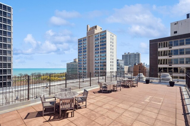 3033 N Sheridan Rd Unit 603, Chicago, IL 60657 - view of patio / terrace featuring a view of city and a water view