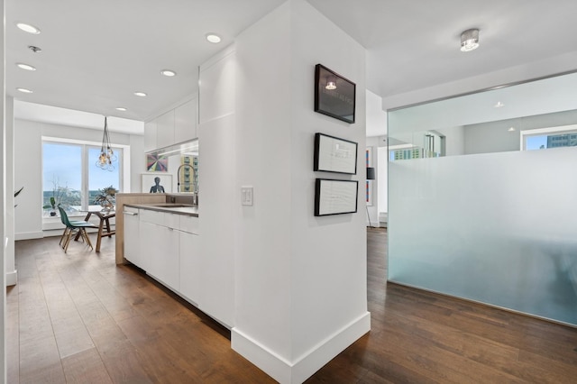 161 E Chicago Ave Unit 31F, Chicago, IL 60611 - corridor with dark wood-style flooring, recessed lighting, and a chandelier