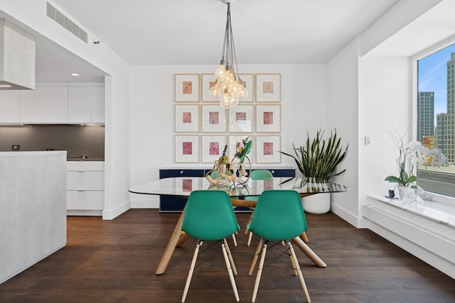 161 E Chicago Ave Unit 31F, Chicago, IL 60611 - dining room featuring dark wood-style flooring, a chandelier, and recessed lighting