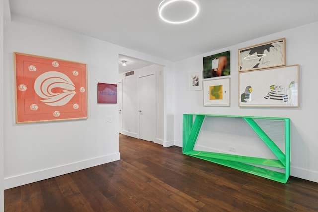 161 E Chicago Ave Unit 31F, Chicago, IL 60611 - playroom with baseboards and wood finished floors