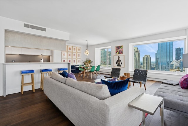161 E Chicago Ave Unit 31F, Chicago, IL 60611 - living area with dark wood-type flooring and a view of skyline