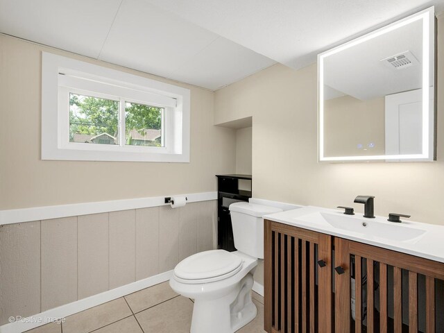 5895 Virginia Ave, Clarendon Hills, IL 60514 - bathroom with vanity, tile patterned flooring, and a wainscoted wall