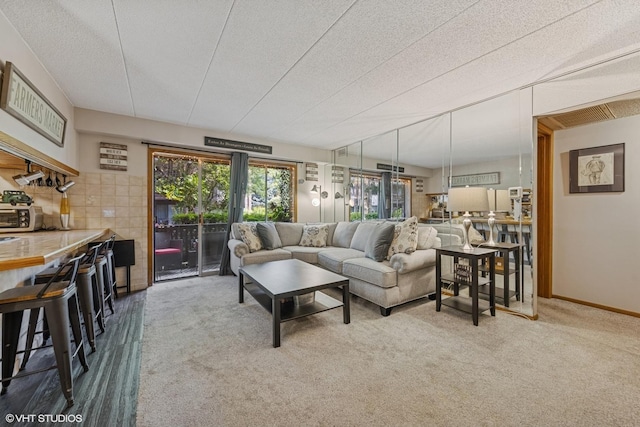 5204 Midlothian Unit 214, Crestwood, IL 60418 - living room featuring carpet and a textured ceiling