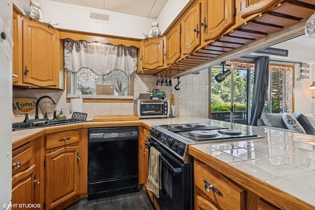 5204 Midlothian Unit 214, Crestwood, IL 60418 - kitchen featuring black dishwasher, electric range, tile counters, and tasteful backsplash