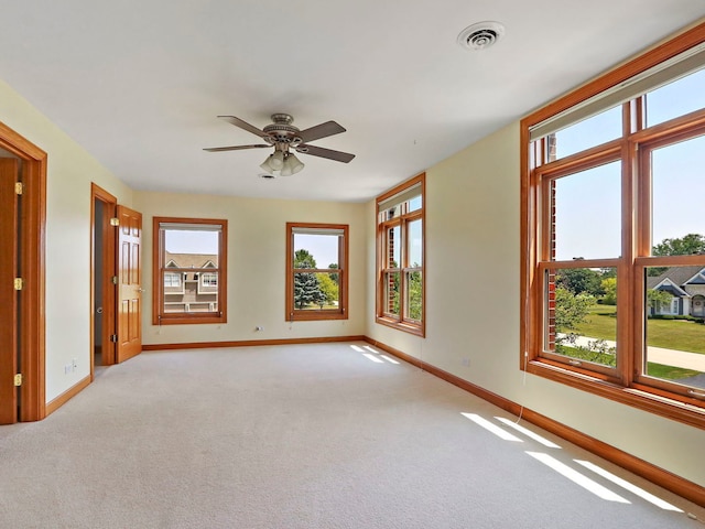 9804 Palmer Dr, Lakewood, IL 60014 - carpeted empty room featuring baseboards and a ceiling fan