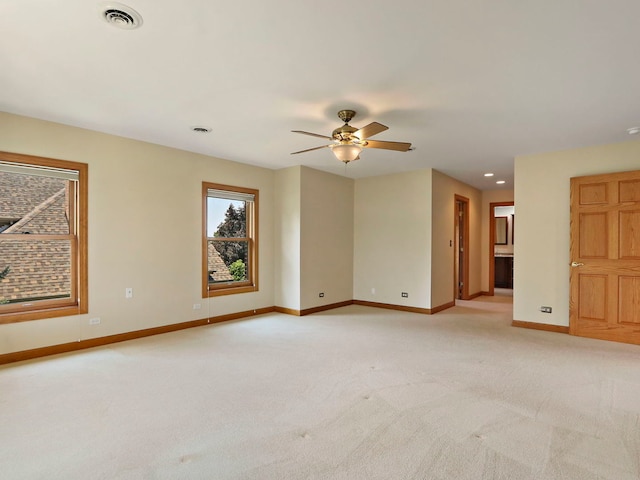 9804 Palmer Dr, Lakewood, IL 60014 - spare room featuring light colored carpet, a ceiling fan, and recessed lighting
