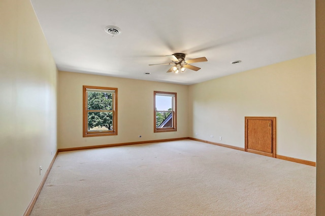 9804 Palmer Dr, Lakewood, IL 60014 - empty room featuring ceiling fan and light carpet
