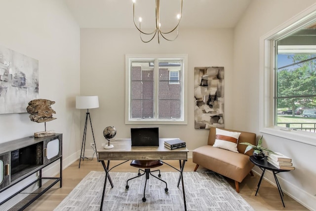 1437 Ashland Ave, River Forest, IL 60305 - office featuring light wood finished floors and a chandelier