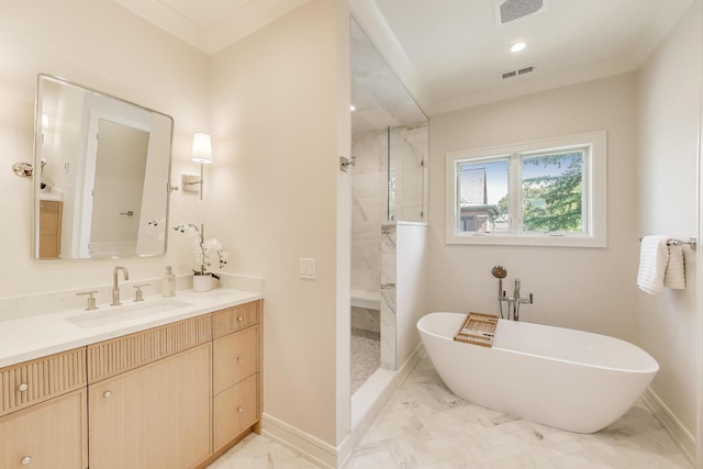 1437 Ashland Ave, River Forest, IL 60305 - bathroom featuring marble finish floors, a marble finish shower, a freestanding bath, and vanity