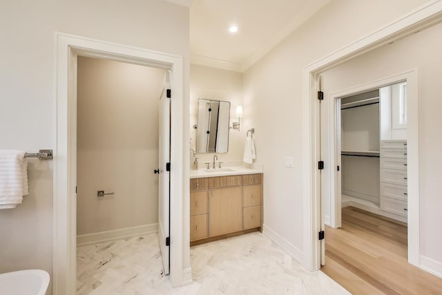 1437 Ashland Ave, River Forest, IL 60305 - full bath with vanity, marble look tile flooring, recessed lighting, a soaking tub, and ornamental molding