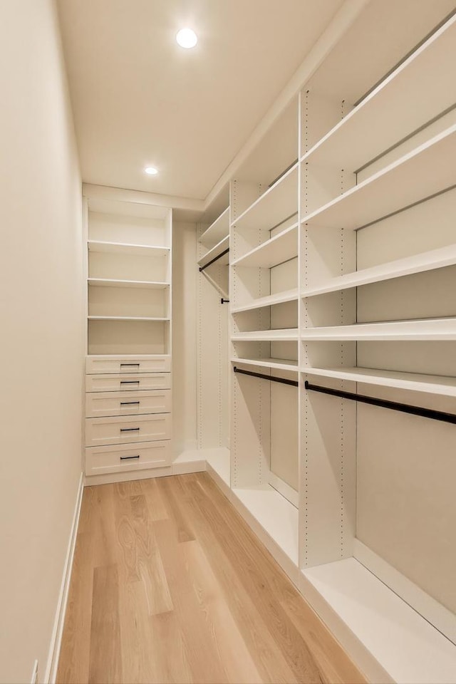 1437 Ashland Ave, River Forest, IL 60305 - walk in closet with light wood-style flooring