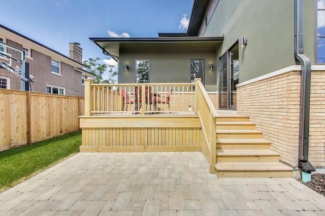 1437 Ashland Ave, River Forest, IL 60305 - back of house featuring stucco siding, a patio area, and brick siding
