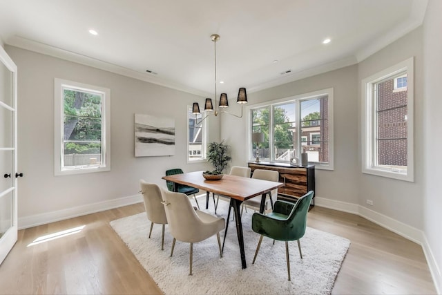 1437 Ashland Ave, River Forest, IL 60305 - dining area with light wood-type flooring, healthy amount of natural light, crown molding, and recessed lighting