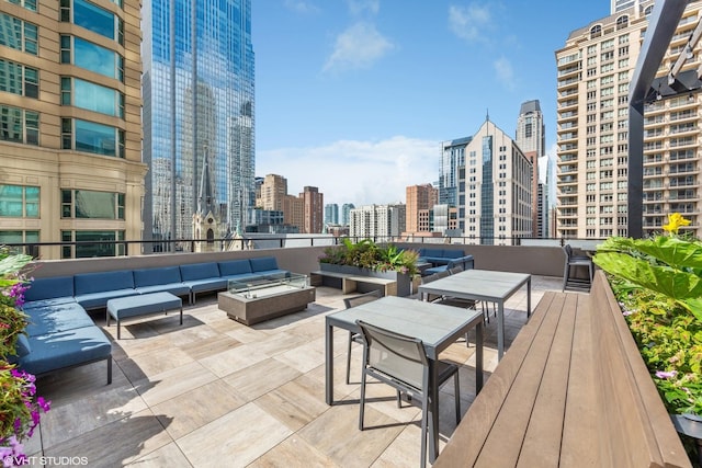 30 E Huron St Unit 2108, Chicago, IL 60611 - view of patio / terrace featuring an outdoor living space and a view of skyline