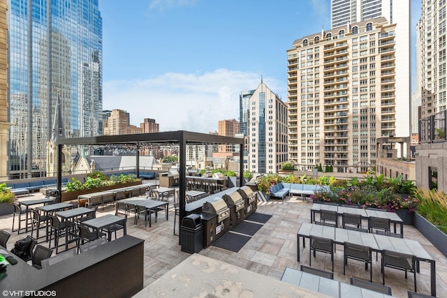 30 E Huron St Unit 2108, Chicago, IL 60611 - view of patio featuring an outdoor hangout area and a city view