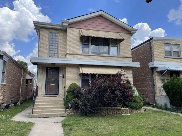2020 W 53rd Pl, Chicago, IL 60609 - view of front of house featuring brick siding and a front yard