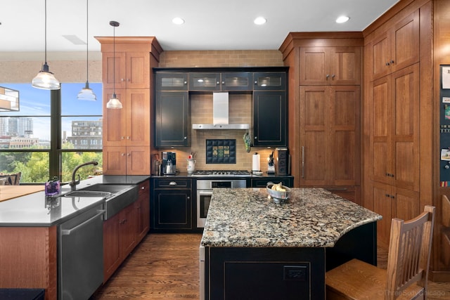849 W Monroe St Unit Ph5, Chicago, IL 60607 - kitchen featuring appliances with stainless steel finishes, wall chimney exhaust hood, tasteful backsplash, recessed lighting, and dark wood finished floors