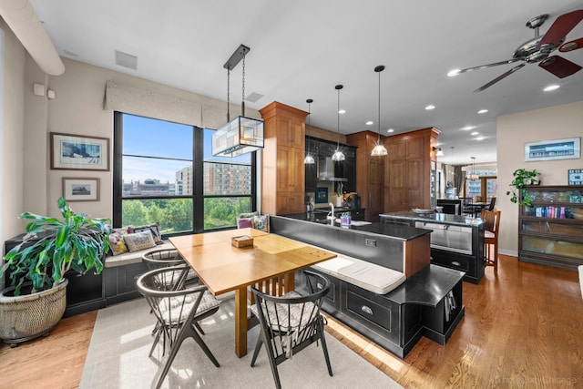 849 W Monroe St Unit Ph5, Chicago, IL 60607 - dining area with light wood-style floors, ceiling fan, and recessed lighting