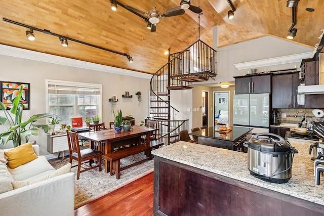 1532 N Greenview Ave, Chicago, IL 60642 - kitchen with track lighting, a ceiling fan, dark wood-type flooring, freestanding refrigerator, and vaulted ceiling