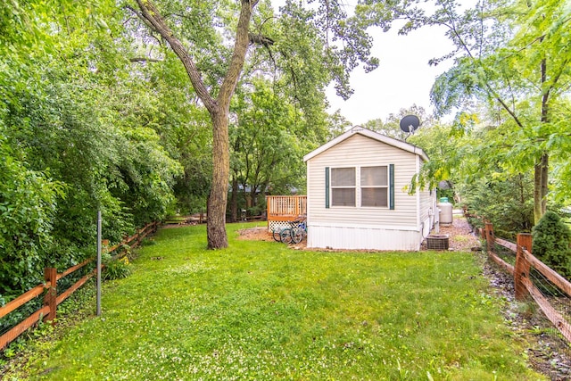 59 Fossil Ridge Ct, Wilmington, IL 60481 - view of yard featuring a wooden deck