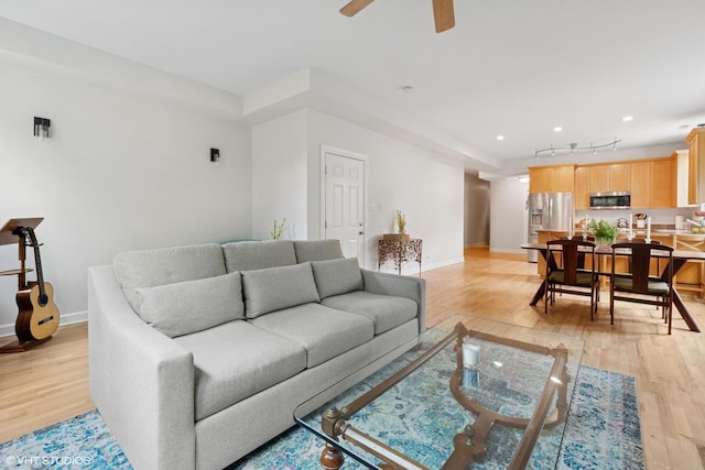 1931 N Campbell Ave Unit 2S, Chicago, IL 60647 - living area featuring light wood-style flooring and ceiling fan