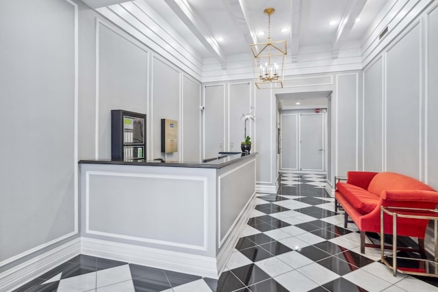 1255 N State Pkwy Unit 3D, Chicago, IL 60610 - welcome area featuring a decorative wall, a chandelier, recessed lighting, and beamed ceiling