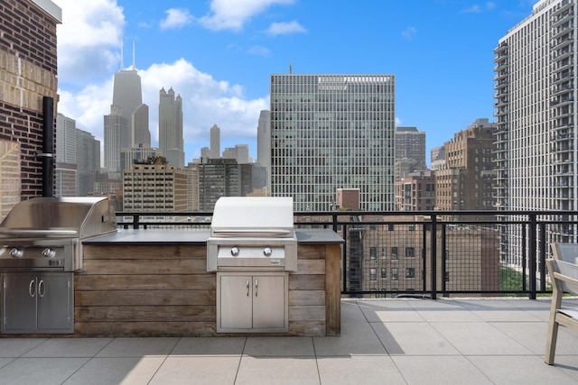 1255 N State Pkwy Unit 3D, Chicago, IL 60610 - view of patio / terrace featuring an outdoor kitchen and a view of skyline