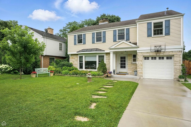 2907 Orchard Ave, Wilmette, IL 60091 - view of front of home featuring stone siding, a garage, a front yard, and a standing seam roof