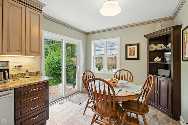 2907 Orchard Ave, Wilmette, IL 60091 - dining room with crown molding and light tile patterned flooring