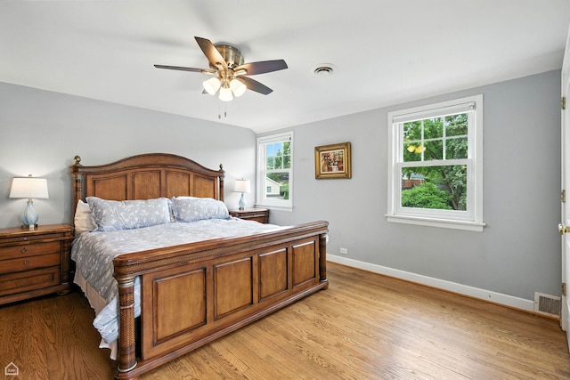 2907 Orchard Ave, Wilmette, IL 60091 - bedroom with light wood-type flooring and ceiling fan