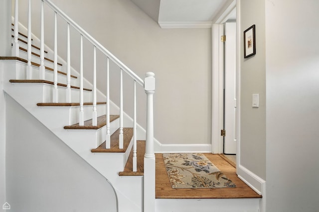 2907 Orchard Ave, Wilmette, IL 60091 - staircase with ornamental molding and wood finished floors