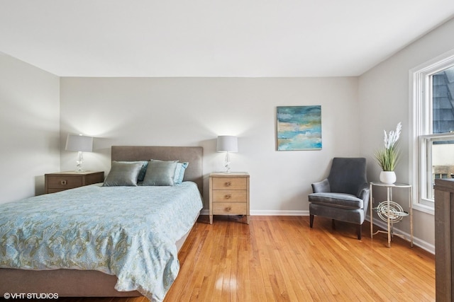 840 Forest Ave Unit C, Evanston, IL 60202 - bedroom featuring wood-type flooring and multiple windows