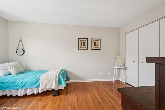 840 Forest Ave Unit C, Evanston, IL 60202 - bedroom featuring a closet and wood finished floors