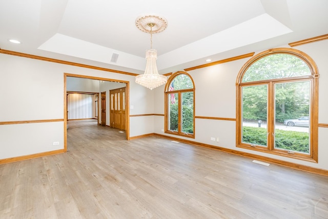 771 E Hickory Ave, Addison, IL 60101 - unfurnished room featuring a raised ceiling, a chandelier, light wood-type flooring, and recessed lighting