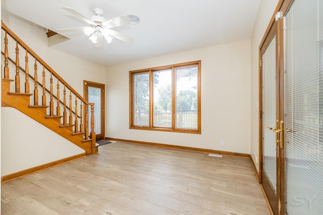 771 E Hickory Ave, Addison, IL 60101 - foyer featuring light wood-type flooring, stairway, and french doors