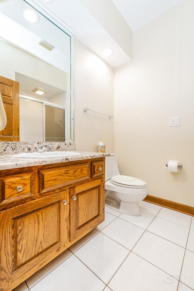 771 E Hickory Ave, Addison, IL 60101 - full bath featuring vanity, tile patterned flooring, and a shower with shower door