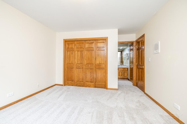 771 E Hickory Ave, Addison, IL 60101 - unfurnished bedroom featuring carpet flooring and a closet