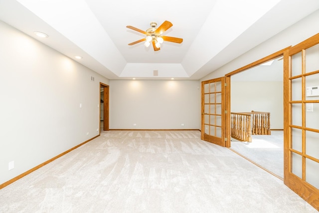 771 E Hickory Ave, Addison, IL 60101 - unfurnished room featuring carpet floors, ceiling fan, a raised ceiling, recessed lighting, and french doors