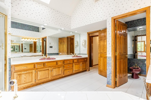 771 E Hickory Ave, Addison, IL 60101 - bathroom with wallpapered walls, double vanity, a bidet, high vaulted ceiling, and a skylight