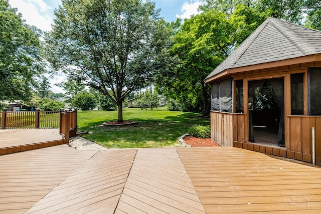 771 E Hickory Ave, Addison, IL 60101 - wooden deck featuring a yard and a sunroom