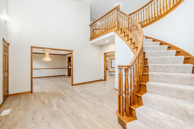771 E Hickory Ave, Addison, IL 60101 - stairs featuring a high ceiling and wood finished floors