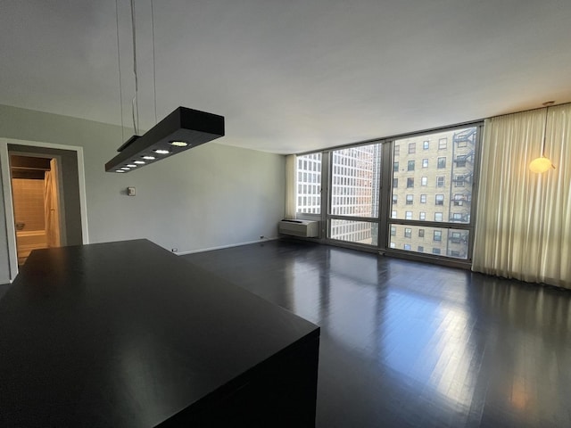 880 N Lake Shore Dr Unit 6F, Chicago, IL 60611 - unfurnished room with a wall of windows and dark wood-style flooring