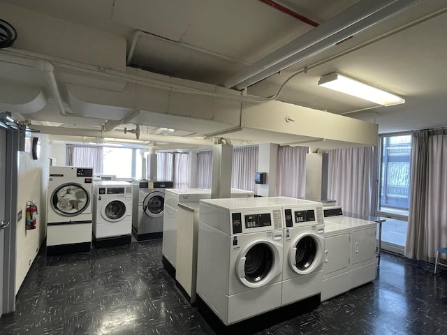 880 N Lake Shore Dr Unit 6F, Chicago, IL 60611 - community laundry with washing machine and dryer and dark flooring