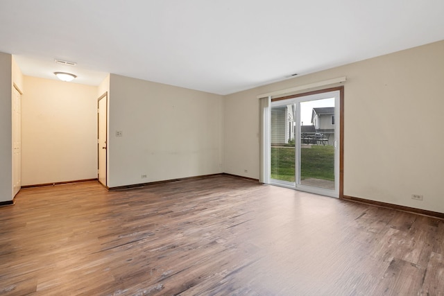 331 Regatta Point -, Schaumburg, IL 60194 - spare room featuring wood finished floors and baseboards