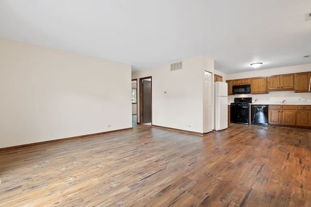 331 Regatta Point -, Schaumburg, IL 60194 - unfurnished living room with wood finished floors and baseboards