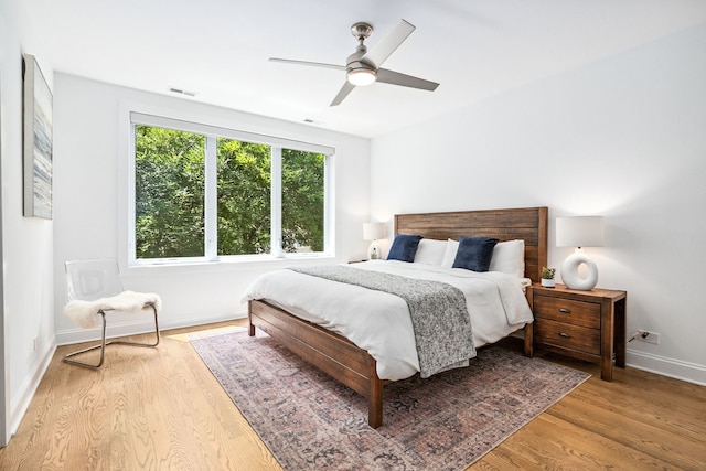 1726 W Huron St, Chicago, IL 60622 - bedroom with light wood-type flooring and ceiling fan